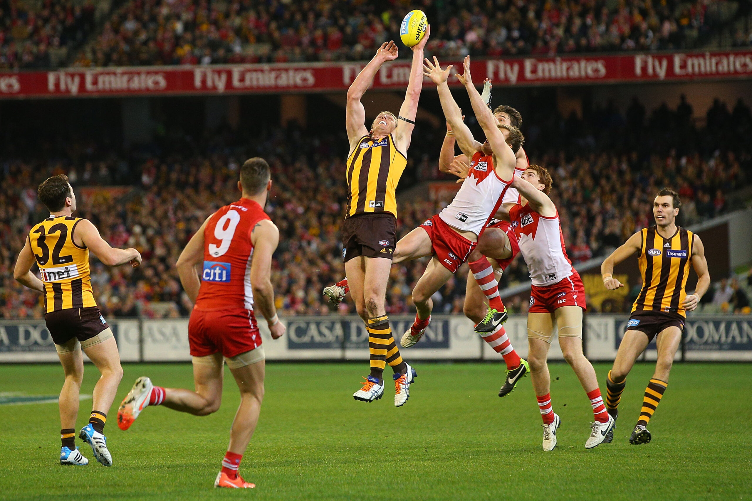 MELBOURNE, AUSTRALIA - JULY 26: Ben McEvoy of the Hawks competes for the ball during the round 18 AFL match between the Hawthorn Hawks and the Sydney Swans at Melbourne Cricket Ground on July 26, 2014 in Melbourne, Australia.  (Photo by Michael Dodge/Getty Images)